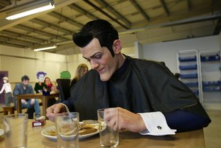 Robbie eating brown sauce.jpg